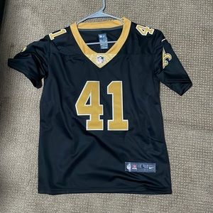 Alvin Kamara jersey, boys L, worn a few times, good condition